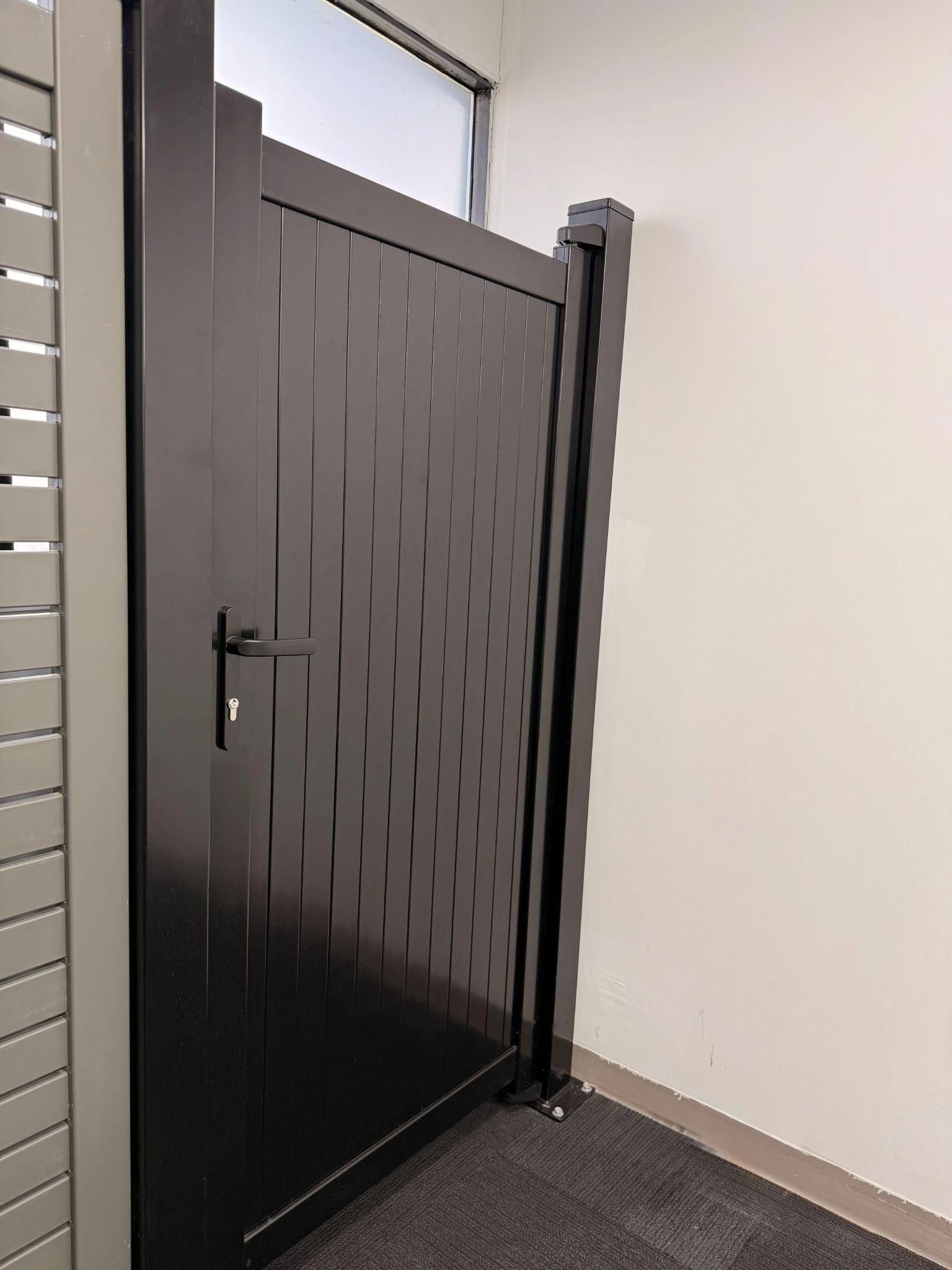 Vertical slat pedestrian gate